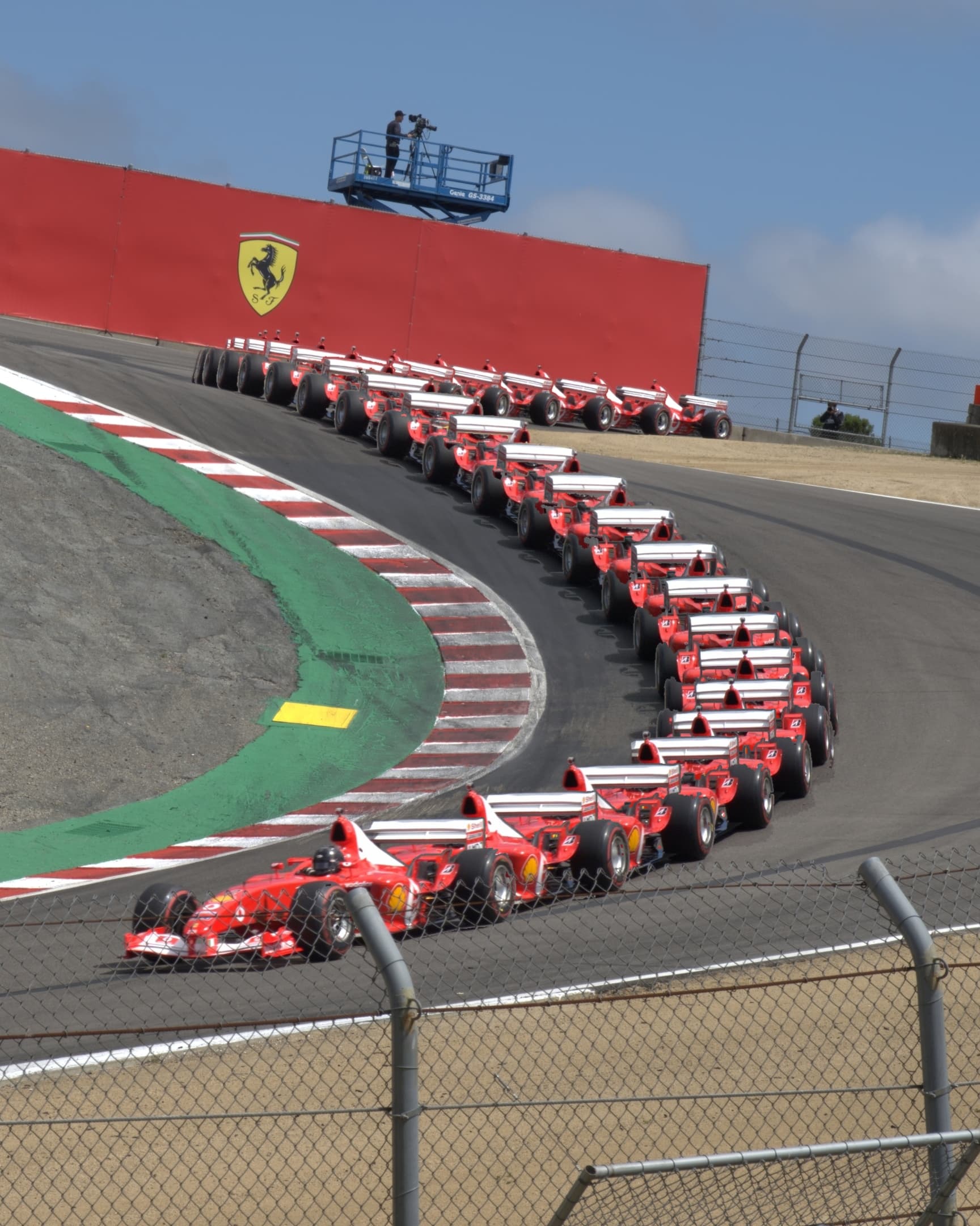 Photographic Ferrari motion trail through the Corkscrew at Laguna Seca.